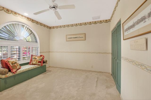 2373 NW 25th Way, Boca Raton, FL 33434 - living area featuring carpet flooring, a ceiling fan, and wallpapered walls