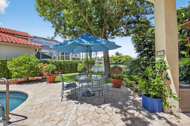 2373 NW 25th Way, Boca Raton, FL 33434 - view of patio with outdoor dining area and a pool