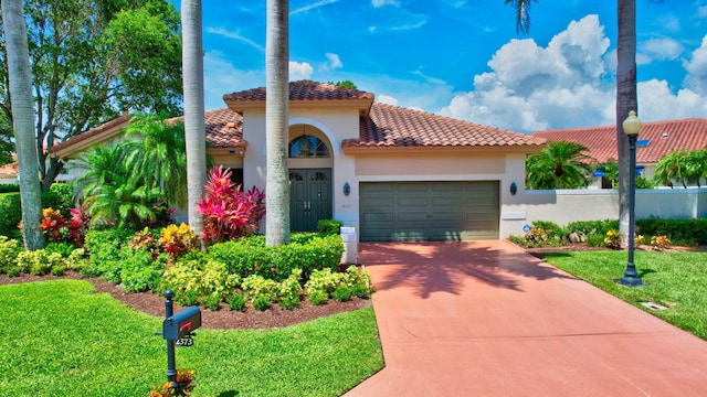 2373 NW 25th Way, Boca Raton, FL 33434 - mediterranean / spanish home featuring a tiled roof, concrete driveway, a garage, and stucco siding