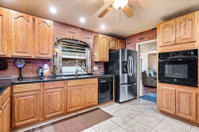 8330 NW 23rd St, Pembroke Pines, FL 33024 - kitchen featuring black appliances, a sink, decorative backsplash, light tile patterned floors, and a ceiling fan