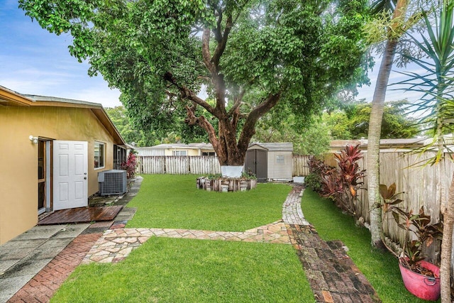 8330 NW 23rd St, Pembroke Pines, FL 33024 - view of yard featuring central AC unit