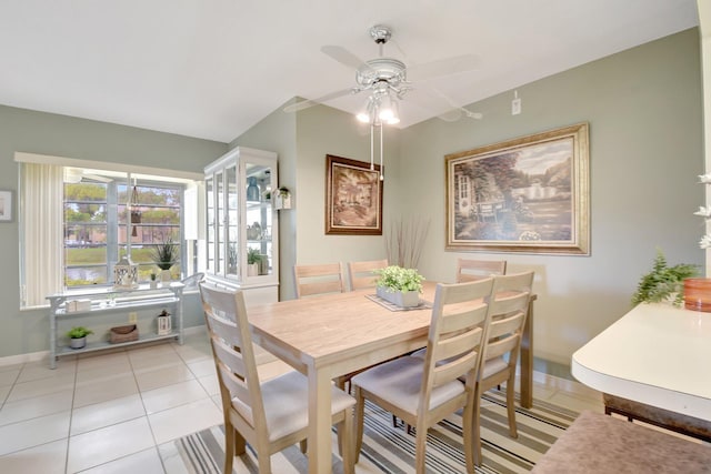 338 Pine Ridge Cir Unit B-1, Greenacres, FL 33463 - dining area with a ceiling fan, light tile patterned floors, and baseboards