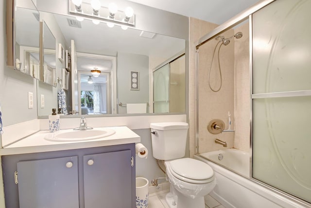 338 Pine Ridge Cir Unit B-1, Greenacres, FL 33463 - bathroom with vanity, bath / shower combo with glass door, toilet, and tile patterned floors