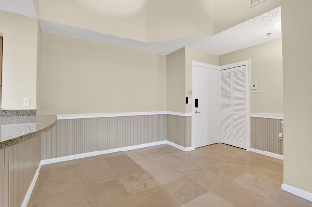 3131 Clint Moore Rd Unit 206, Boca Raton, FL 33496 - empty room featuring wainscoting and baseboards