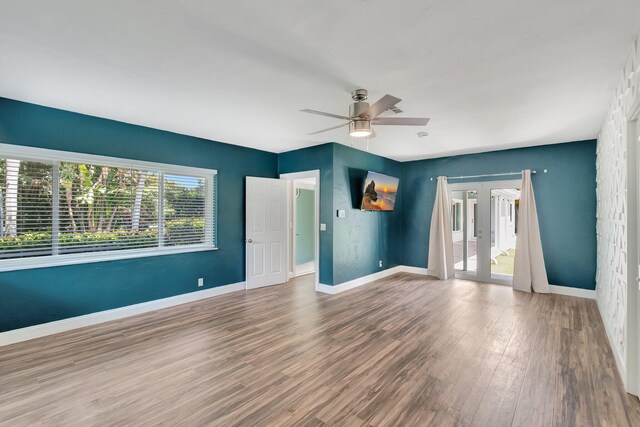 1220 N Swinton Ave, Delray Beach, FL 33444 - empty room featuring ceiling fan, wood finished floors, and baseboards
