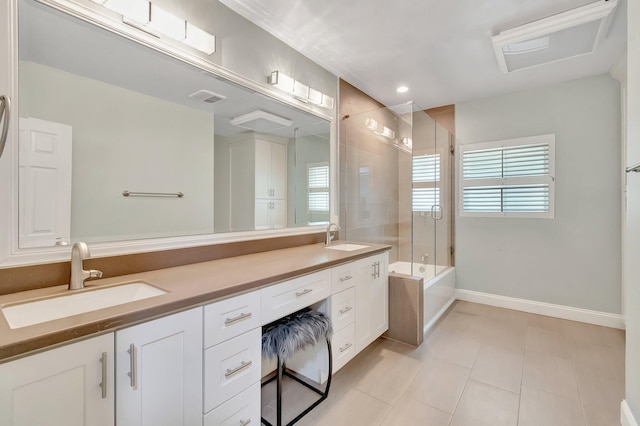 1220 N Swinton Ave, Delray Beach, FL 33444 - full bath featuring tile patterned floors, double vanity, enclosed tub / shower combo, baseboards, and recessed lighting