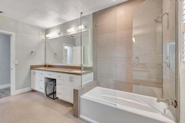 1220 N Swinton Ave, Delray Beach, FL 33444 - full bathroom with double vanity, baseboards, and tile patterned floors