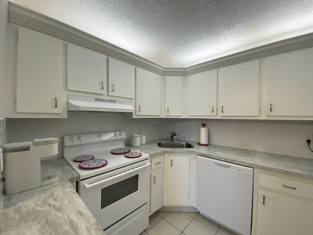 302 Pine Ridge Cir Unit D-1, Greenacres, FL 33463 - kitchen featuring white appliances, under cabinet range hood, a sink, a textured ceiling, and light countertops