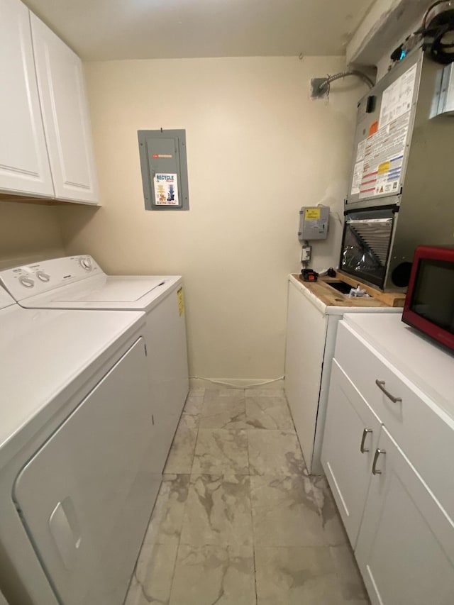 302 Pine Ridge Cir Unit D-1, Greenacres, FL 33463 - laundry area with electric panel, light marble finish floors, cabinet space, washer and clothes dryer, and baseboards