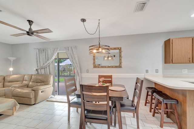 3928 Coelebs Ave, Boynton Beach, FL 33436 - dining room featuring light tile patterned flooring and a ceiling fan