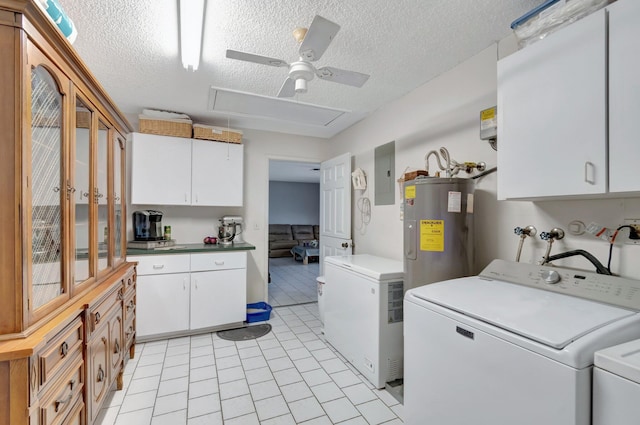 3928 Coelebs Ave, Boynton Beach, FL 33436 - laundry area featuring independent washer and dryer, cabinet space, electric panel, a textured ceiling, and light tile patterned floors