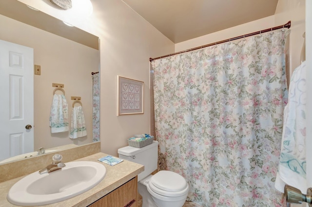 3928 Coelebs Ave, Boynton Beach, FL 33436 - full bathroom with vanity, toilet, and a shower with curtain