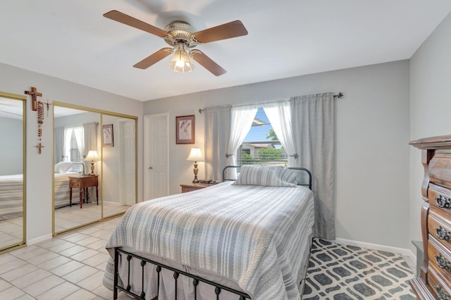 3928 Coelebs Ave, Boynton Beach, FL 33436 - bedroom with light tile patterned flooring, baseboards, and a ceiling fan