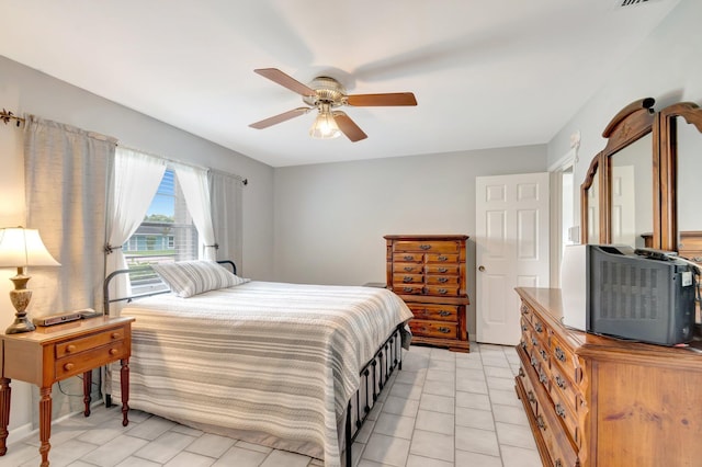 3928 Coelebs Ave, Boynton Beach, FL 33436 - bedroom with ceiling fan and light tile patterned flooring