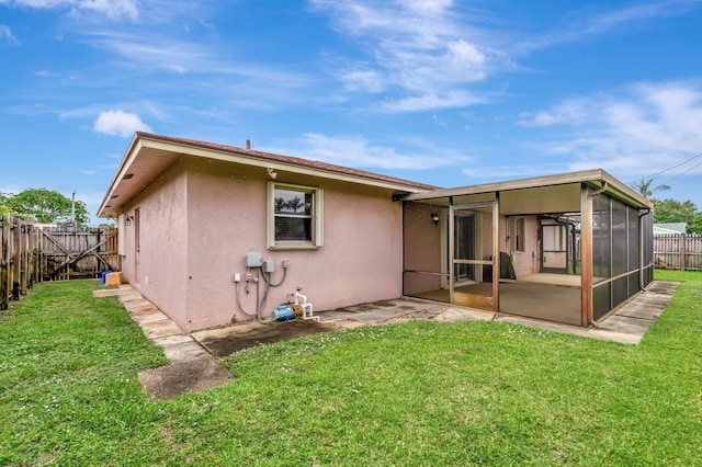 3928 Coelebs Ave, Boynton Beach, FL 33436 - back of property with a sunroom and stucco siding