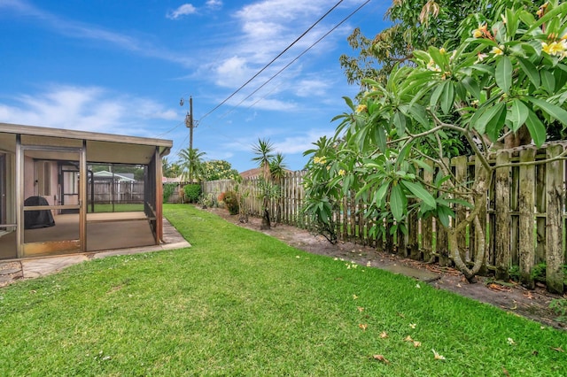 3928 Coelebs Ave, Boynton Beach, FL 33436 - view of yard with a sunroom