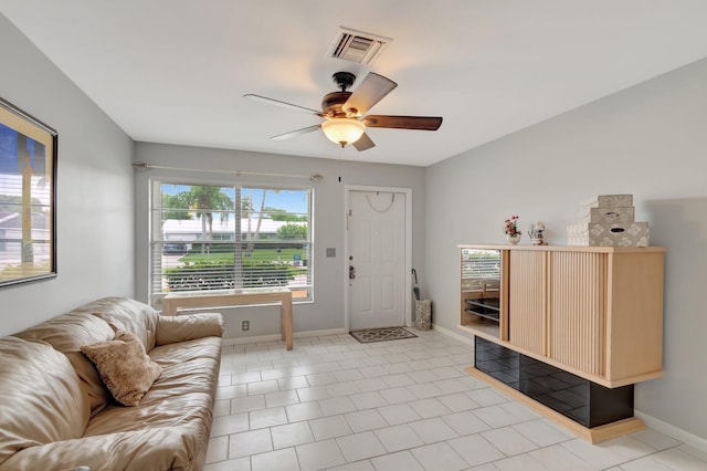 3928 Coelebs Ave, Boynton Beach, FL 33436 - foyer with baseboards, a ceiling fan, and light tile patterned floors