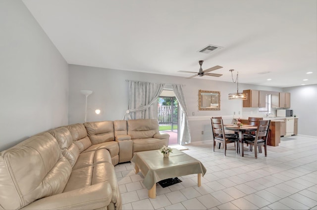 3928 Coelebs Ave, Boynton Beach, FL 33436 - living room featuring ceiling fan and light tile patterned flooring