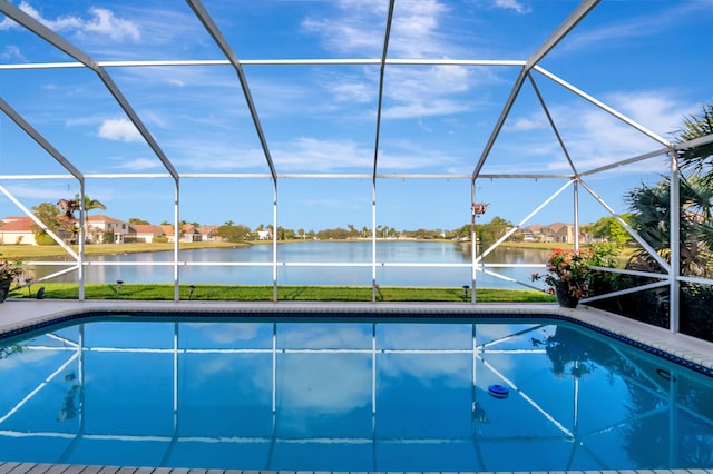 9461 Aegean Dr, Boca Raton, FL 33496 - swimming pool featuring glass enclosure, a water view, and a patio