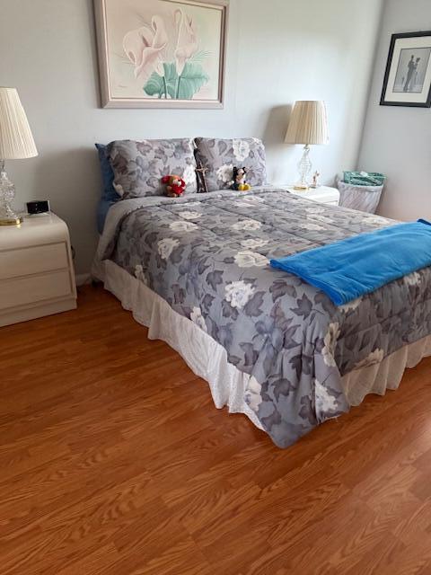 725 Lori Dr Unit 313, Palm Springs, FL 33461 - bedroom with wood finished floors