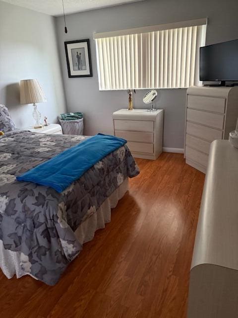 725 Lori Dr Unit 313, Palm Springs, FL 33461 - bedroom featuring light wood-style floors