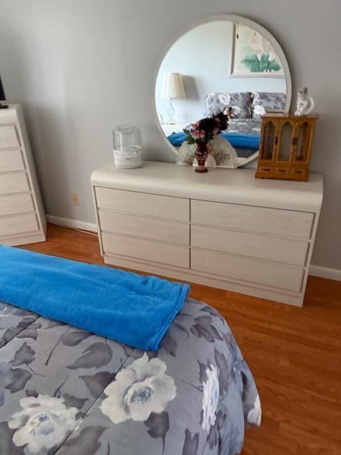 725 Lori Dr Unit 313, Palm Springs, FL 33461 - bedroom featuring wood finished floors