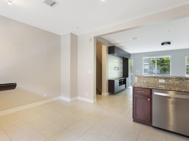 110 W Coda Cir Unit 110, Delray Beach, FL 33444 - kitchen with stainless steel dishwasher, light tile patterned floors, baseboards, and light stone countertops
