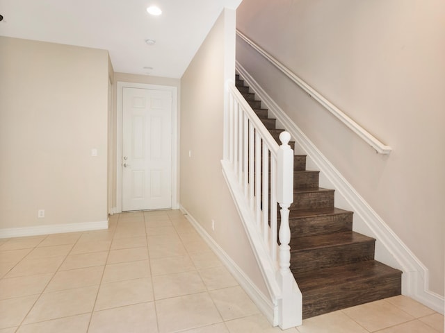 110 W Coda Cir Unit 110, Delray Beach, FL 33444 - stairway with tile patterned floors, baseboards, and recessed lighting