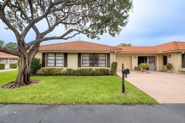 4600 Wildwood Tree A Ln Unit A, Boynton Beach, FL 33436 - ranch-style house featuring an attached garage, driveway, stucco siding, and a tiled roof