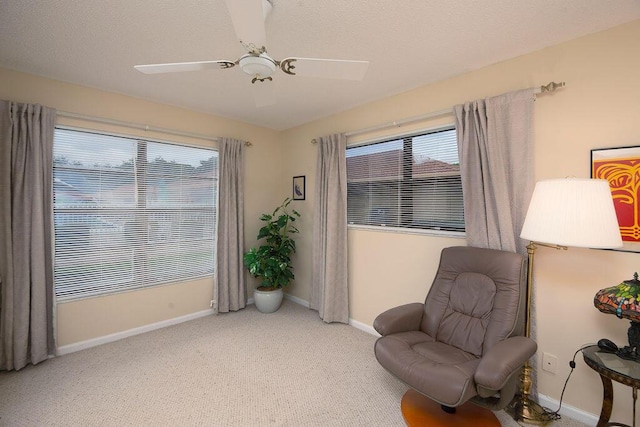 4600 Wildwood Tree A Ln Unit A, Boynton Beach, FL 33436 - living area featuring baseboards, light carpet, and a ceiling fan