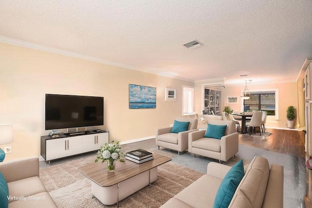 4600 Wildwood Tree A Ln Unit A, Boynton Beach, FL 33436 - living area featuring a textured ceiling, crown molding, and baseboards
