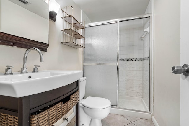 521 Shady Pine Way Unit C2, Greenacres, FL 33415 - bathroom with toilet, a stall shower, tile patterned floors, and vanity