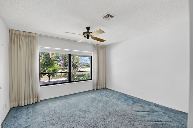 3946 Quail Ridge Dr N, Boynton Beach, FL 33436 - carpeted spare room featuring ceiling fan, a textured ceiling, and baseboards