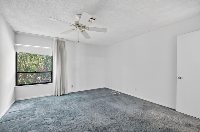 3946 Quail Ridge Dr N, Boynton Beach, FL 33436 - carpeted empty room with ceiling fan, a textured ceiling, and baseboards