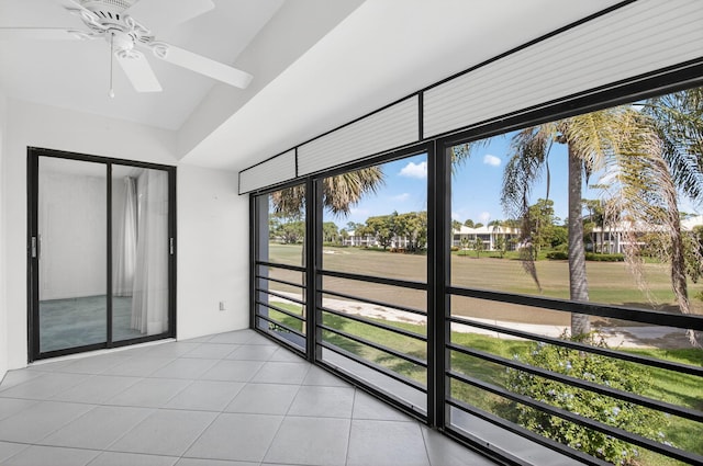 3946 Quail Ridge Dr N, Boynton Beach, FL 33436 - unfurnished sunroom with a ceiling fan, tile patterned floors, and lofted ceiling
