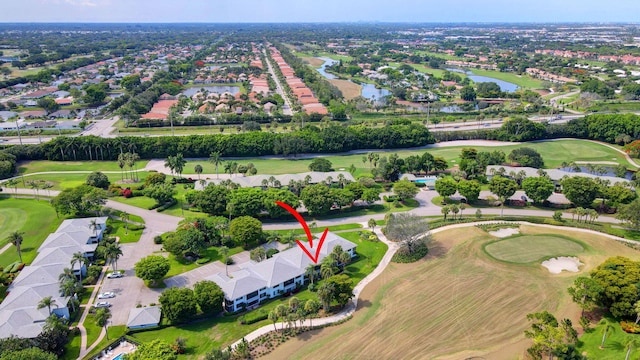 3946 Quail Ridge Dr N, Boynton Beach, FL 33436 - aerial overview of property's location with a golf course, a nearby body of water, and nearby suburban area