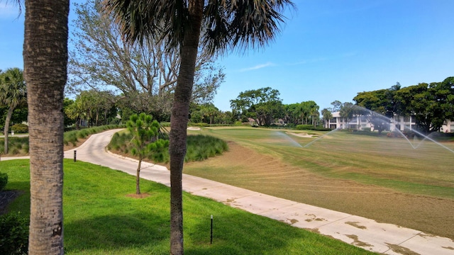 3946 Quail Ridge Dr N, Boynton Beach, FL 33436 - surrounding community with a lawn and view of golf course