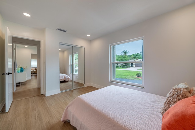 18085 102nd Way S, Boca Raton, FL 33498 - bedroom with light wood-type flooring, recessed lighting, and a closet