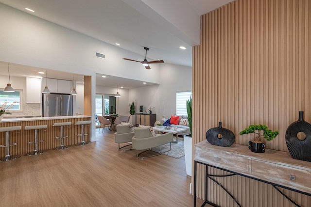 18085 102nd Way S, Boca Raton, FL 33498 - living room featuring high vaulted ceiling, a ceiling fan, light wood-type flooring, and recessed lighting