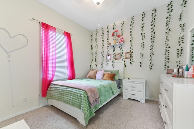 2450 SW Summit St, Port Saint Lucie, FL 34984 - bedroom with baseboards and light carpet