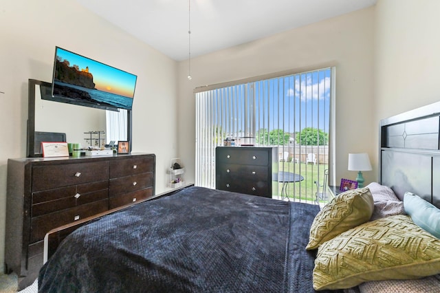 2450 SW Summit St, Port Saint Lucie, FL 34984 - bedroom featuring access to outside and carpet flooring