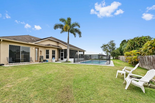 2450 SW Summit St, Port Saint Lucie, FL 34984 - view of yard featuring a sunroom