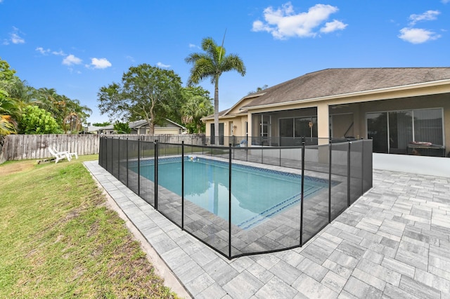 2450 SW Summit St, Port Saint Lucie, FL 34984 - view of swimming pool featuring a patio