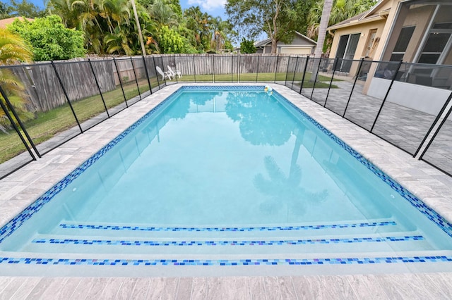 2450 SW Summit St, Port Saint Lucie, FL 34984 - view of pool featuring a fenced backyard