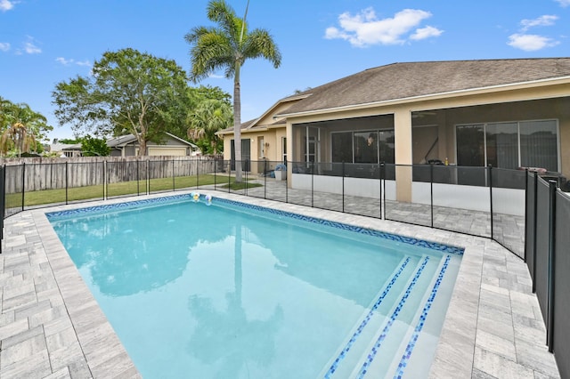 2450 SW Summit St, Port Saint Lucie, FL 34984 - view of swimming pool with a patio