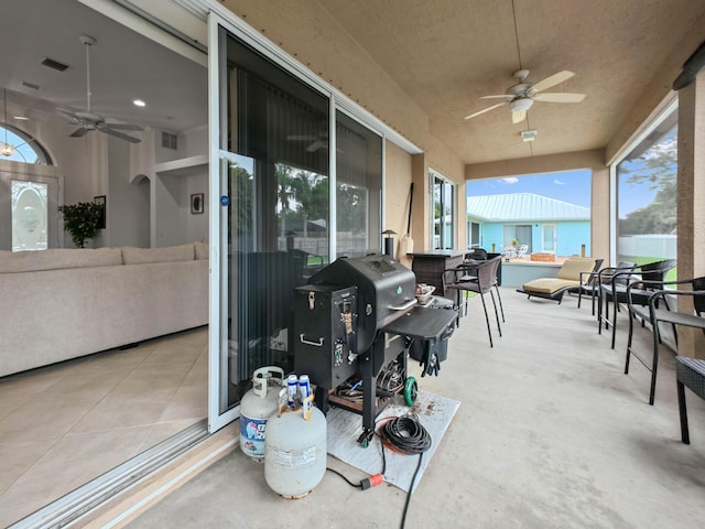 2450 SW Summit St, Port Saint Lucie, FL 34984 - view of patio / terrace with a ceiling fan