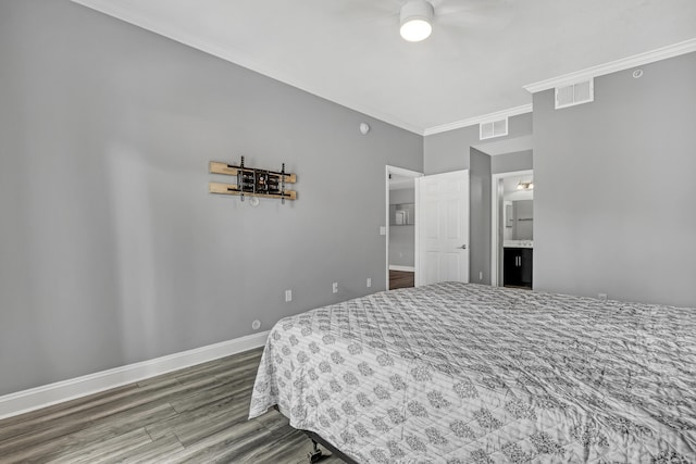 4903 Midtown Ln Unit 3114, Palm Beach Gardens, FL 33418 - bedroom with wood finished floors, ornamental molding, and ensuite bath