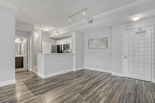 4903 Midtown Ln Unit 3114, Palm Beach Gardens, FL 33418 - unfurnished living room with dark wood-style floors, track lighting, and crown molding