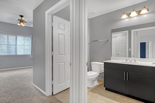 4903 Midtown Ln Unit 3114, Palm Beach Gardens, FL 33418 - bathroom featuring vanity, a ceiling fan, and tile patterned flooring