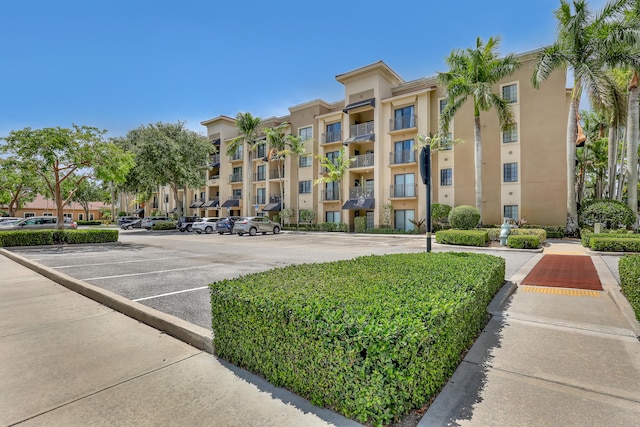 4903 Midtown Ln Unit 3114, Palm Beach Gardens, FL 33418 - view of apartment building / complex featuring uncovered parking